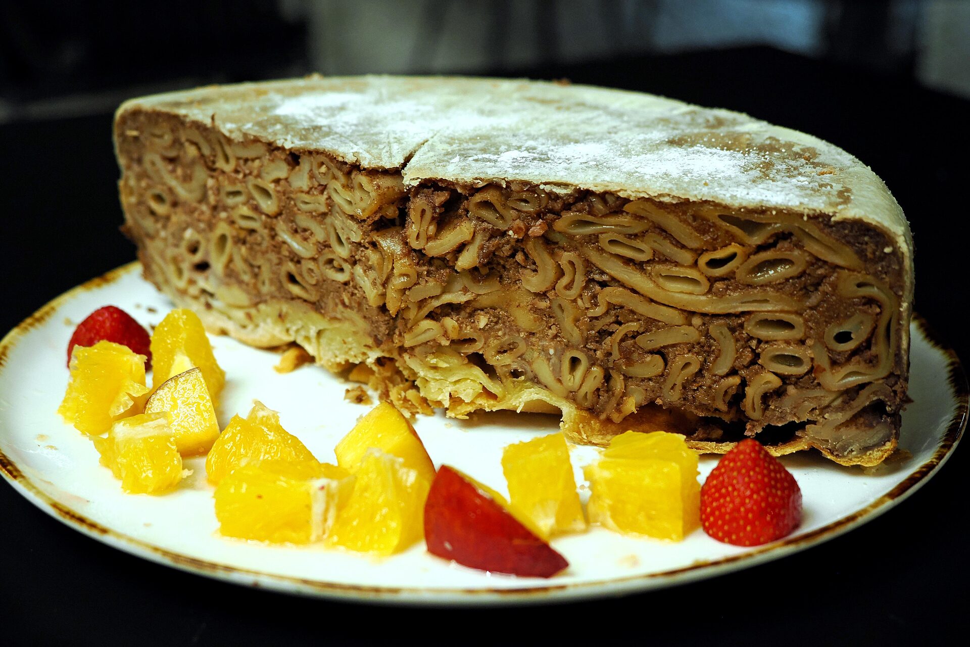 Stonska torta, Ston's traditional pasta cake, with orange and strawberry.